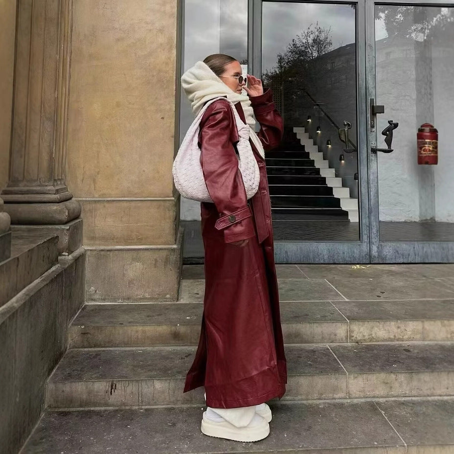 Women's Maxi Length Faux Leather Trench Coat with Wide Lapels, Back Detail, and Tie Belt Fashion Glam