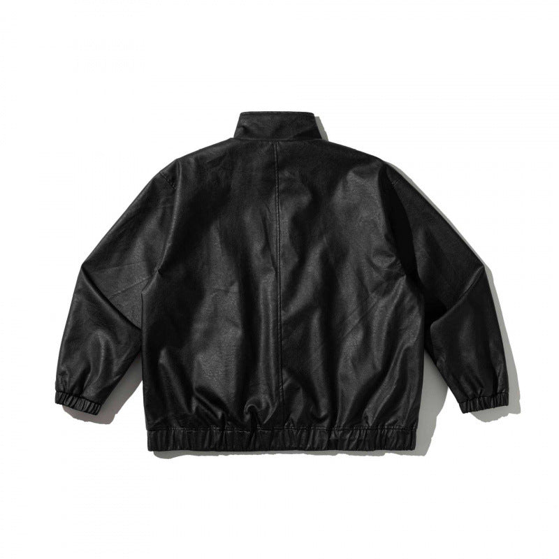 Unisex Boxy-Short Jacket made of vegan leather with a high collar, toggle front, and elastic hem Fashion Glam
