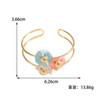Women's bangle with elaborate floral design Fashion Glam