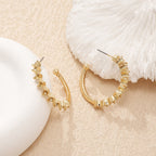 Ladies hoop earrings with intricate structures Fashion Glam