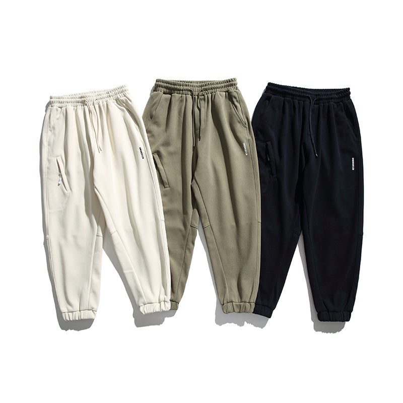 Unisex wide jogging pants in oversized cut with elastic waistband, knee panel and ribbed cuffs Fashion Glam