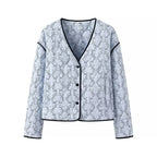 Women's lightweight quilted blouse jacket with V-neck, contrast piping and floral line print Fashion Glam
