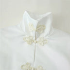 Women's short jacket with stand-up collar and decorative knot closures in Mandarin style Fashion Glam