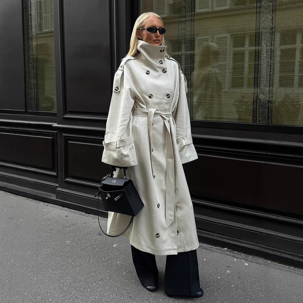 Women's long leather look trench coat with high stand-up collar, waistband and double-breasted button placket Fashion Glam