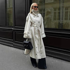 Women's long leather look trench coat with high stand-up collar, waistband and double-breasted button placket Fashion Glam