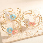 Women's bangle with elaborate floral design Fashion Glam