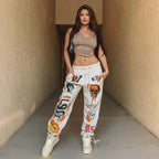 Women's graphic joggers with a high waistband, drawstring, and streetwear prints Fashion Glam