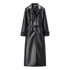 Women’s longline trench coat made of faux leather with a fitted belt and shoulder flaps Fashion Glam
