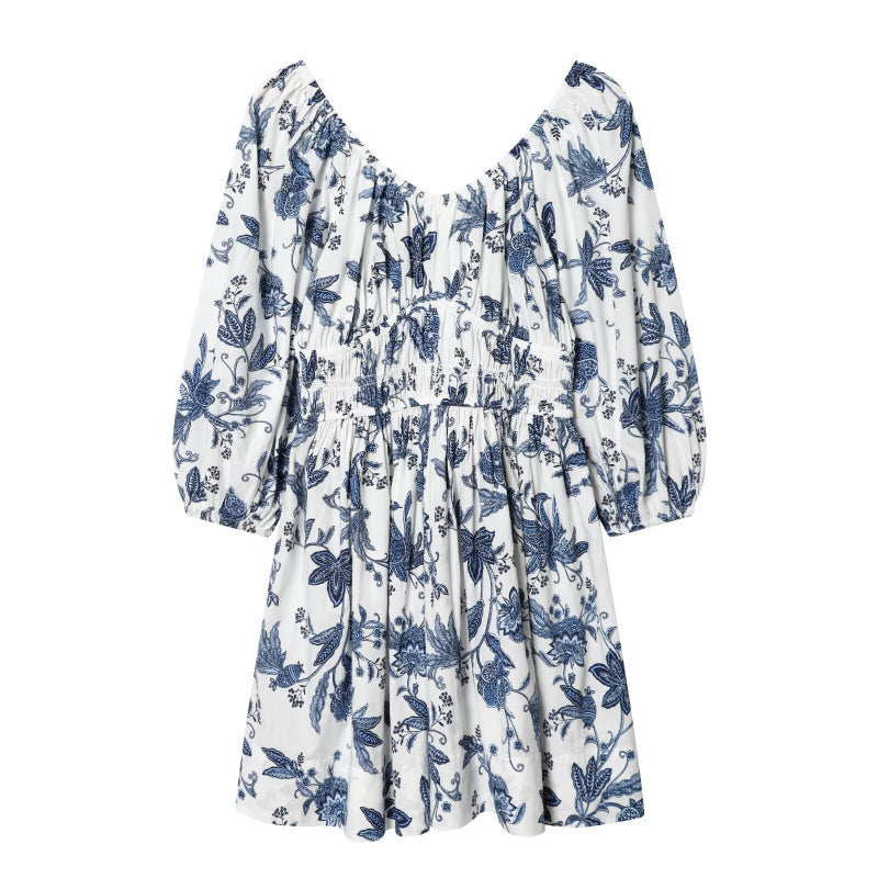Women's floral dress with smocked waist and voluminous puff sleeves Fashion Glam