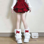 Ladies cozy boot cuffs made of faux fur with bow appliqué and pompons Fashion Glam