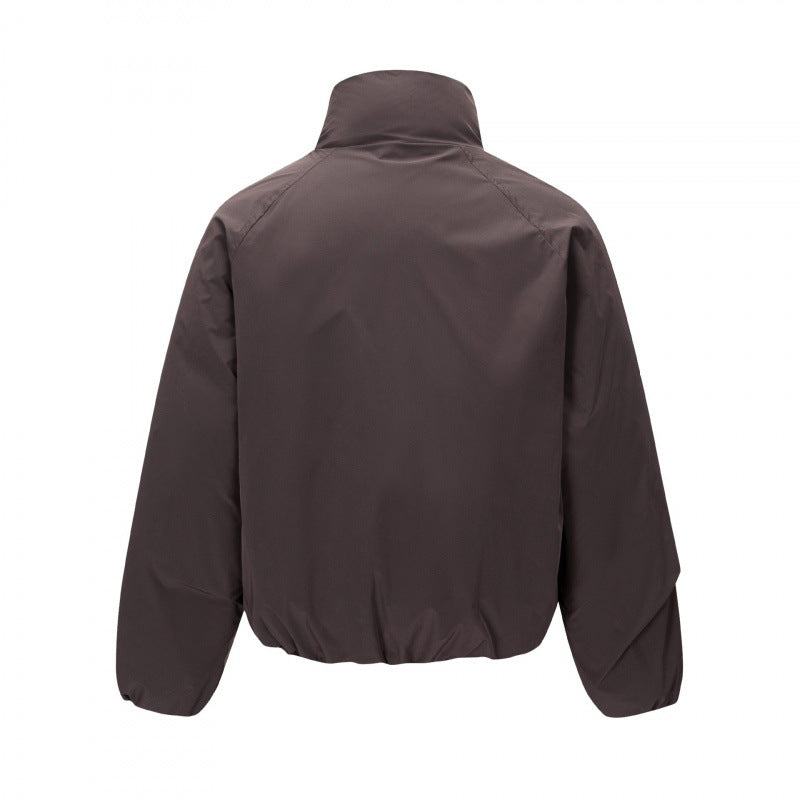 Unisex Short cut lightweight windbreaker in boxy cut with high stand-up collar and elastic hem Fashion Glam