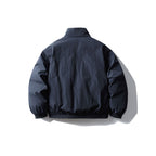 Unisex Boxy quilted transitional jacket with standing collar, elastic hem and zipper pockets Fashion Glam