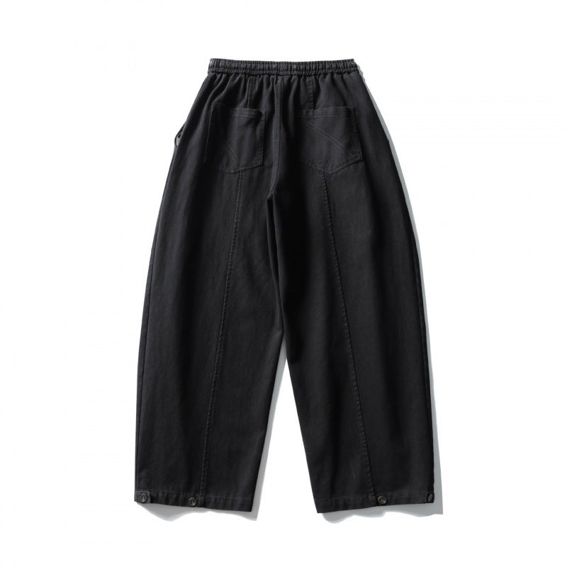 Unisex wide balloon pants made of cotton blend with drawstring waistband and decorative darts Fashion Glam