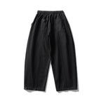 Unisex wide balloon pants made of cotton blend with drawstring waistband and decorative darts Fashion Glam