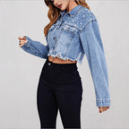 Ladies short denim jacket with pearl embellishments, fringed hem, and wide-cut sleeves Fashion Glam