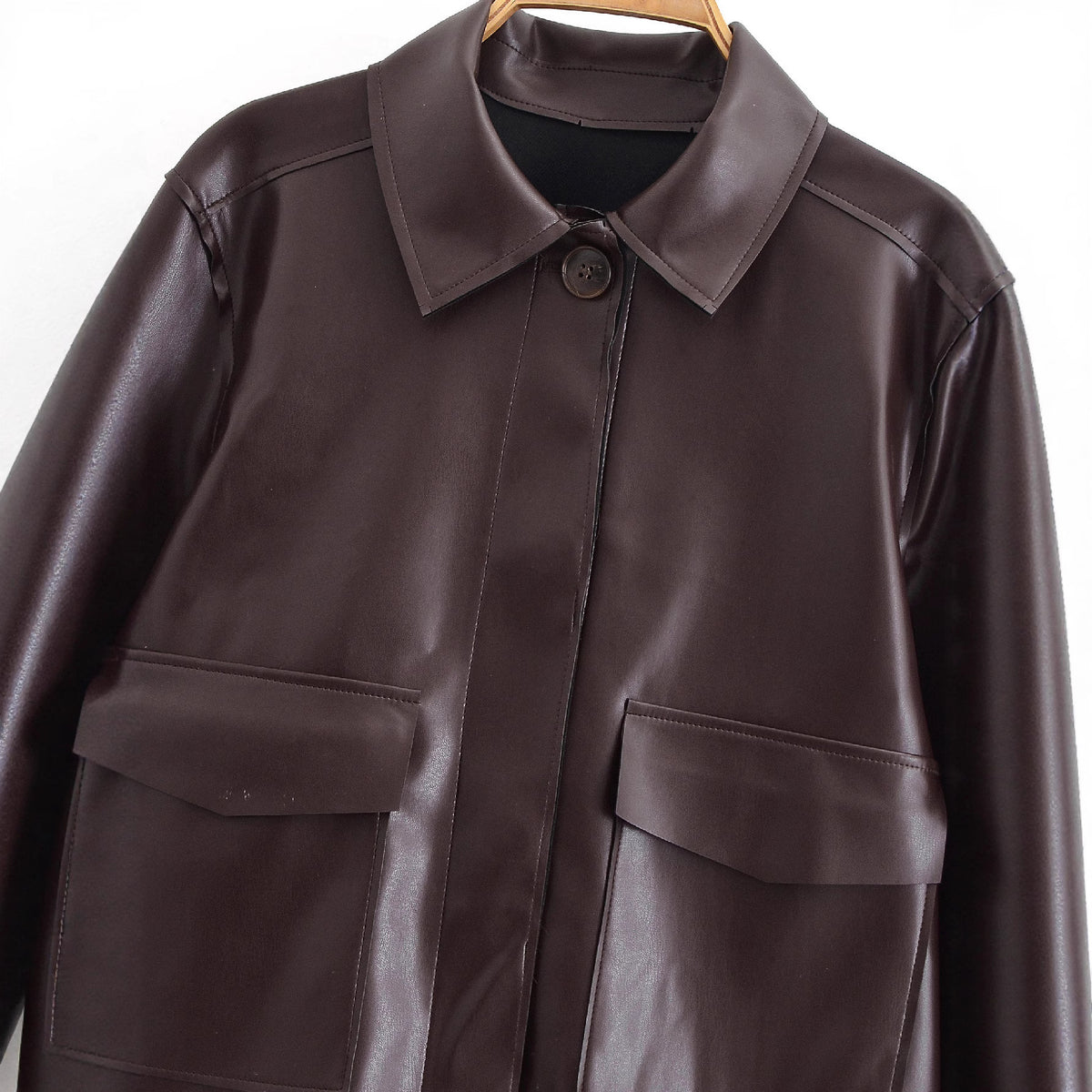 Women Short Boxy Leather-Look Jacket with Flap Pockets and Shirt Collar Fashion Glam