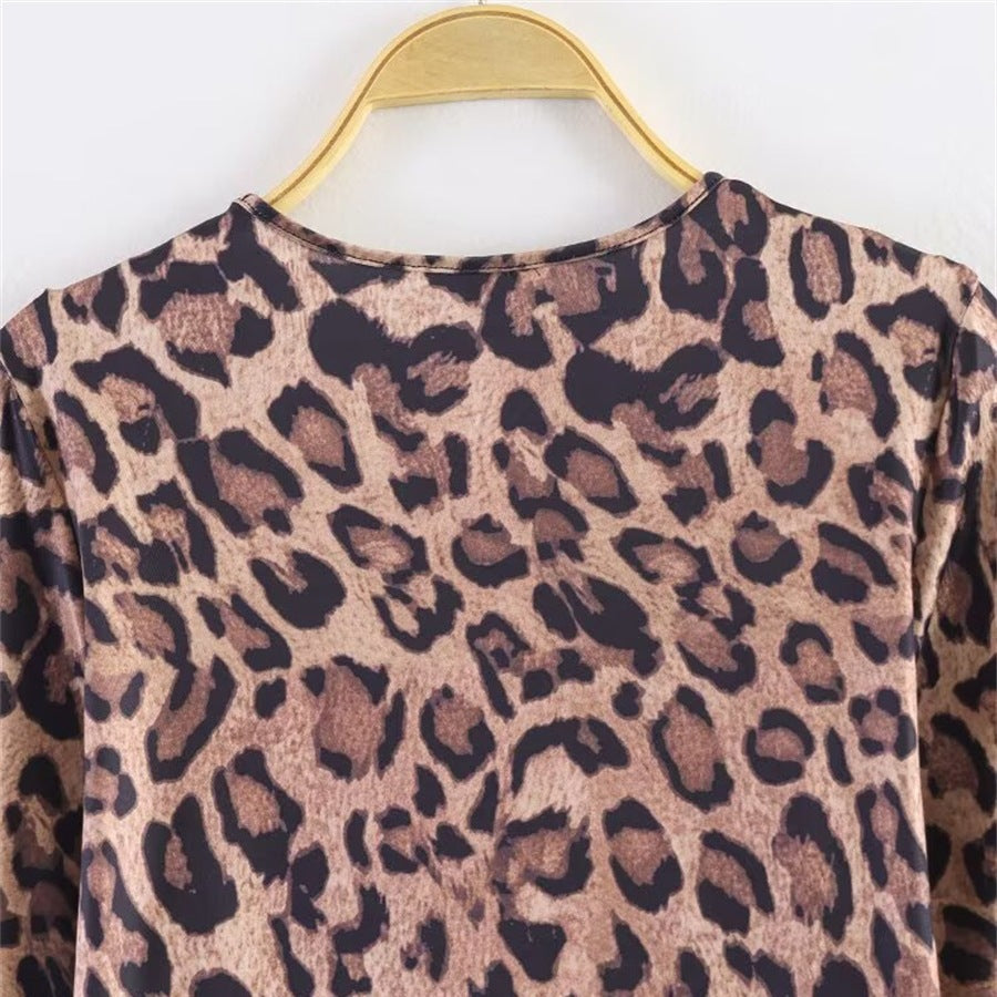 Women’s leopard print mini dress with round neckline, long sleeves, and A-line silhouette Fashion Glam
