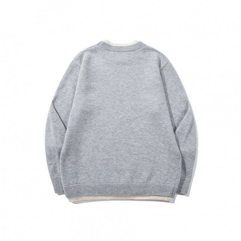 Unisex fine knit sweater with raglan seam and triangular hem adornment Fashion Glam