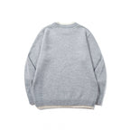 Unisex fine knit sweater with raglan seam and triangular hem adornment Fashion Glam