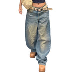 Women's vintage-inspired baggy jeans with a low rise, wide leg, and distressed wash Fashion Glam