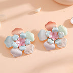 Ladies' flower earrings with intricate design and glossy accents Fashion Glam