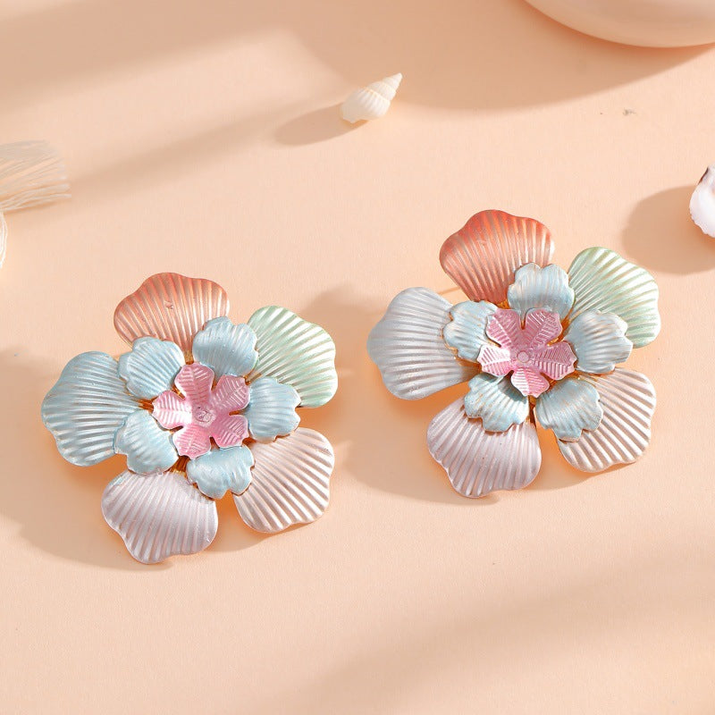 Ladies' flower earrings with intricate design and glossy accents Fashion Glam