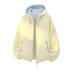 Women's lightweight hooded shell jacket in urban look with contrasting lining, zippered pockets, and elastic hem Fashion Glam