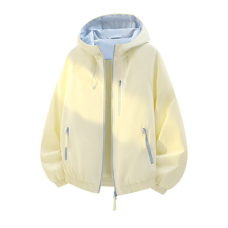Women's lightweight hooded shell jacket in urban look with contrasting lining, zippered pockets, and elastic hem Fashion Glam