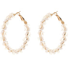 Ladies hoop earrings with luxurious pearl accents and elegant, twisted design Fashion Glam