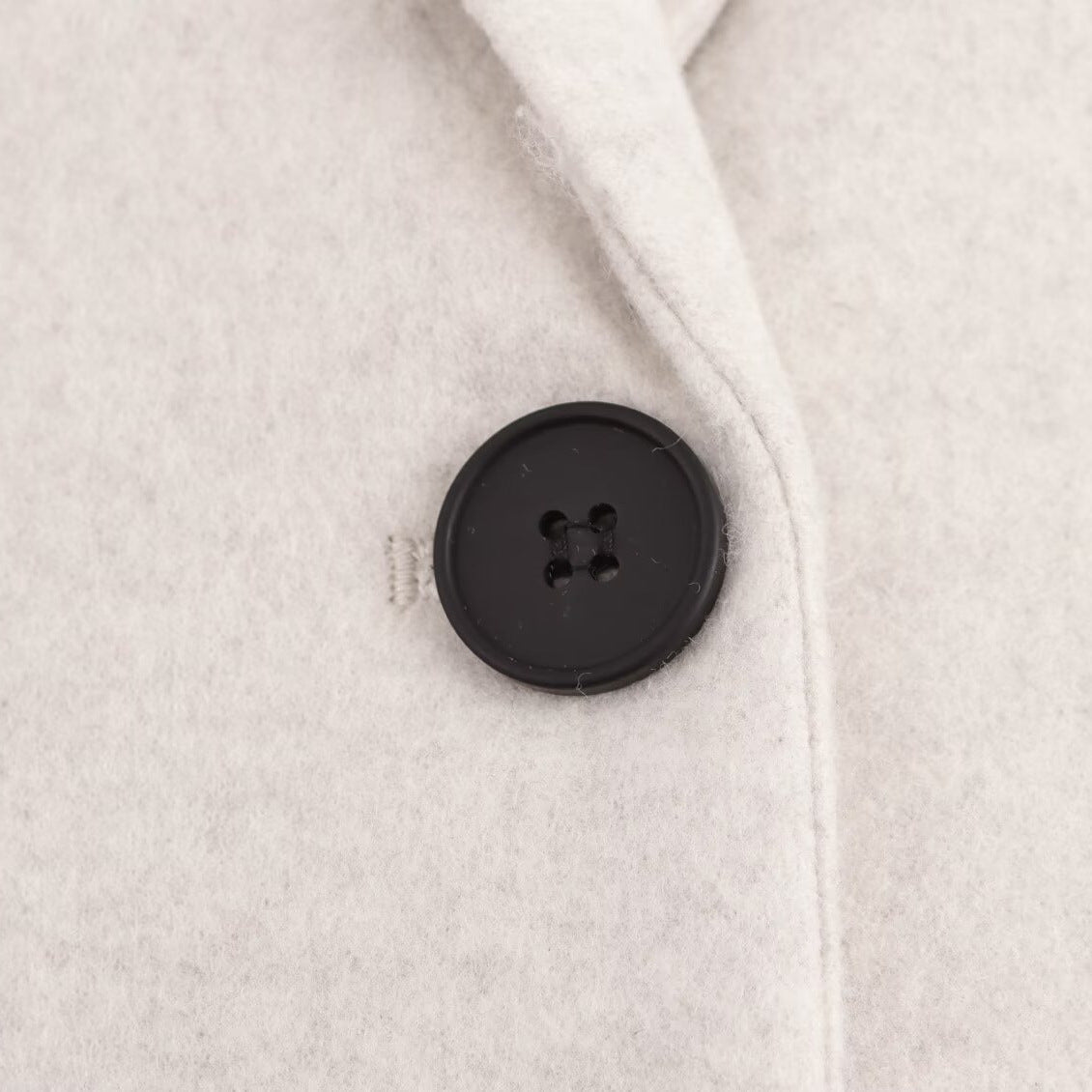 Ladies Purist longline coat with lapel collar, single button closure and soft felt finish Fashion Glam