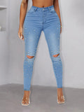 Women pearl-embellished high-waist skinny jeans with knee cutouts Fashion Glam