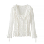 Ladies figure-hugging lace blouse with ruffle V-neck and tie detail Fashion Glam