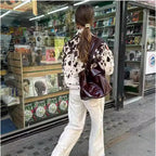 Ladies short-cut western trucker jacket with cow spot look and applied chest pockets Fashion Glam
