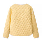 Women's short-cut quilted transitional jacket with round neck, decorative piping, and turn-up cuffs Fashion Glam