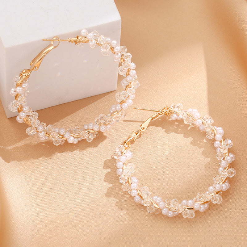 Ladies hoop earrings with luxurious pearl accents and elegant, twisted design Fashion Glam