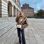 Women's short-cut voluminous faux fur jacket with oversized shawl collar Fashion Glam