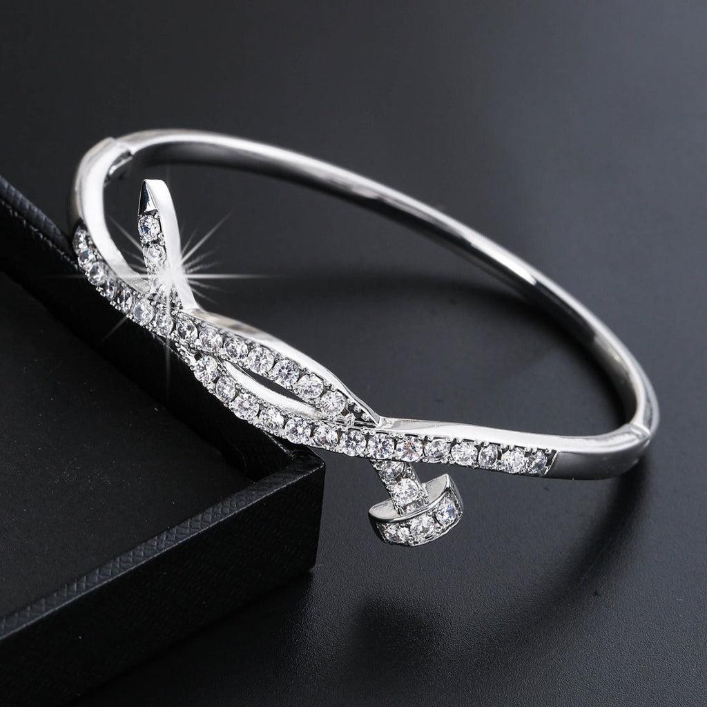 Ladies bracelet with elaborate infinity symbol and sparkling zirconia Fashion Glam