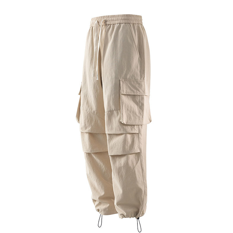 Men's cargo pants with elastic waistband, layered detail and zip hem Fashion Glam