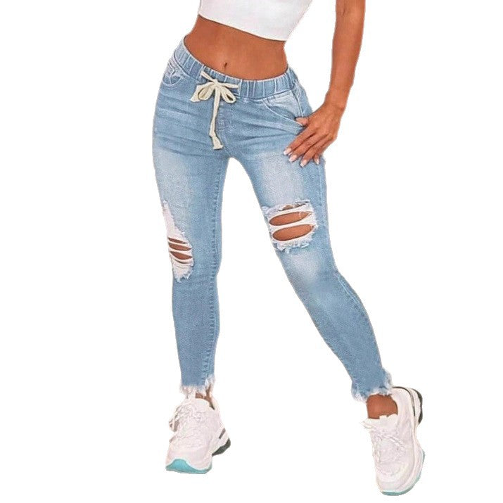 Women High-Waisted Slim Jogger Jeans with Destroyed Inserts and Drawstring Fashion Glam