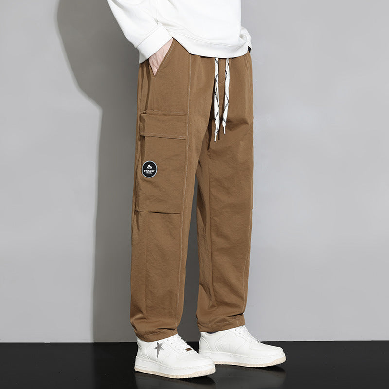 Men's loose-fitting cargo joggers with large flap pocket and drawstring Fashion Glam