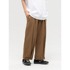 Women Wide High-Waist Pleated Pants with Elastic Drawstring and Cuffed Hem Fashion Glam