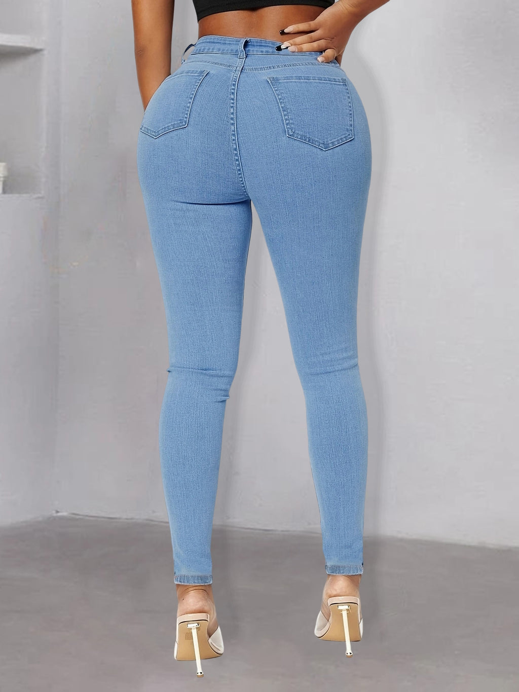 Women pearl-embellished high-waist skinny jeans with knee cutouts Fashion Glam