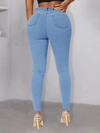 Women pearl-embellished high-waist skinny jeans with knee cutouts Fashion Glam