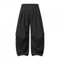 Unisex wide layered pants with balloon-shaped silhouette, high waist and drawstring Fashion Glam