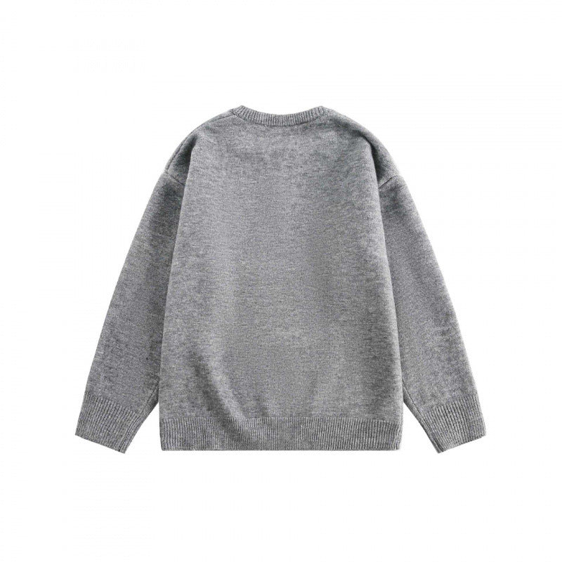 Unisex Boxy fine knit pullover with half Henley opening, round neck and ribbed finishes Fashion Glam