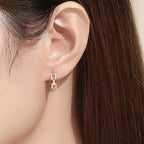 Ladies earrings with sparkling zirconia and modern design Fashion Glam