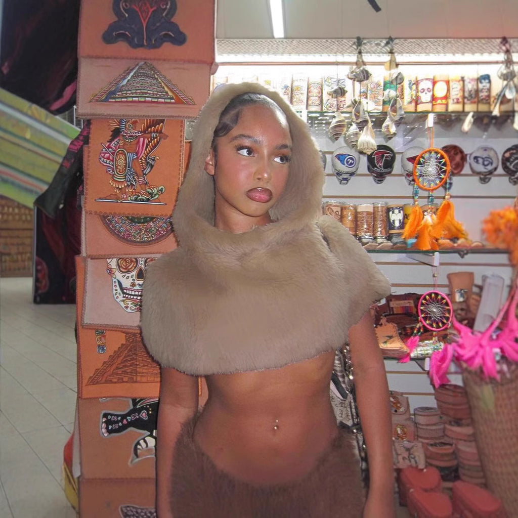 Ladies short hooded capelet made of luxurious faux fur with a concealing shoulder area Fashion Glam