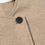 Women's short-cut boxy wool blend blazer with asymmetrical button placket Fashion Glam