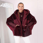 Women's short quilted jacket in cocoon cut with voluminous faux fur trim and hood Fashion Glam