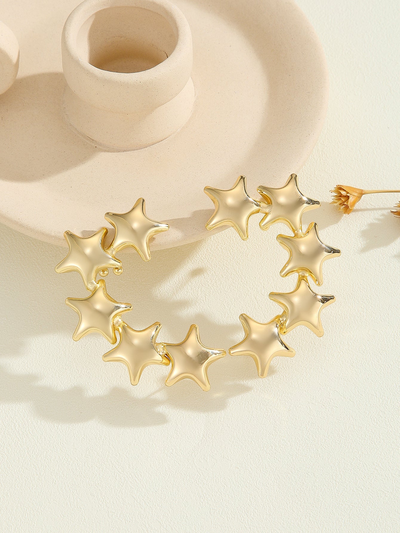 Women's bracelet with structured, golden beads Fashion Glam